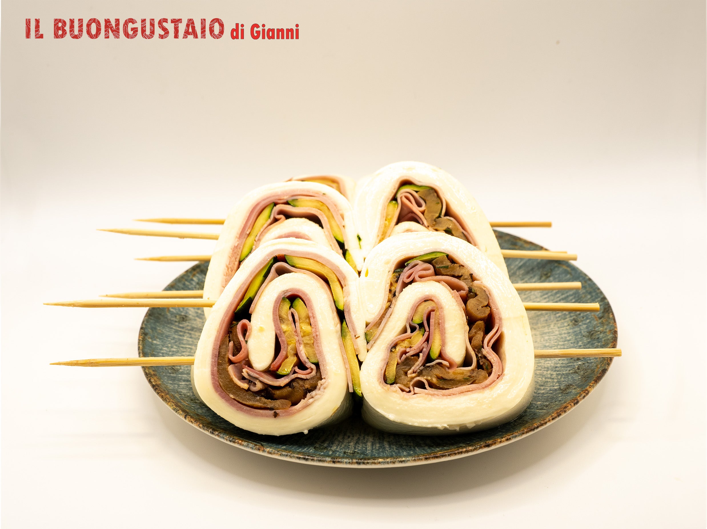 Rotolo di mozzarella prosciutto cotto e zucchine